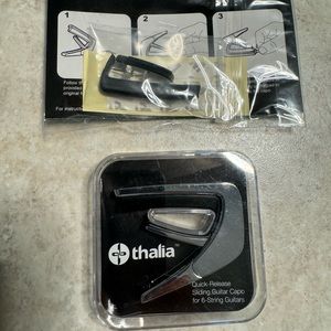 BNIB.Thalia capo mother of pearl